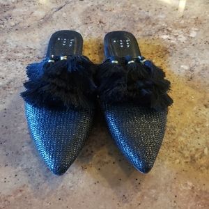 Black tasseled slides. Size 7